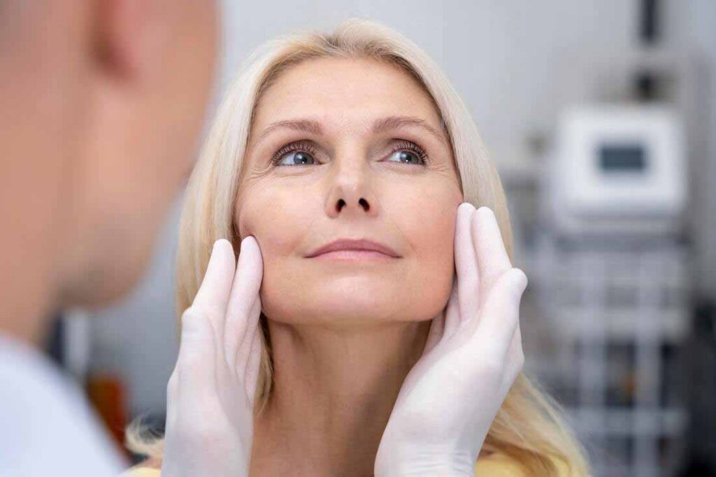 Woman having her lower face and cheek area assessed during a pigmentation and skin consultation
